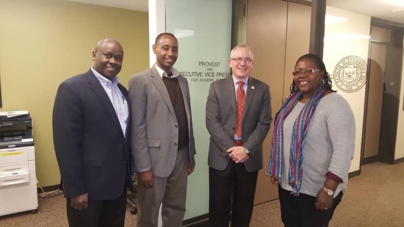 Dr Josephine Ahikire, Dr Aaron Mushengyezi (2nd Left), Dr Andrew State (Left) with Prof. James P. Holloway, Vice Provost for Global Engagement and Interdisciplinary Academic Affairs, University of Michigan
