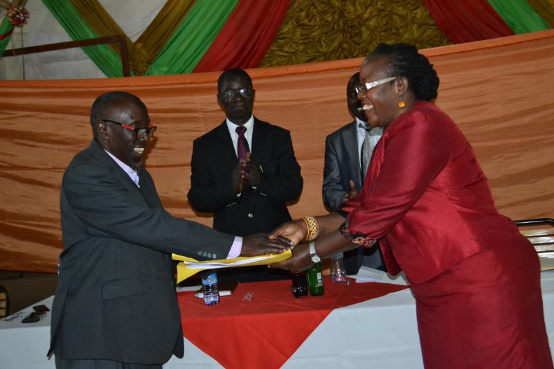 Prof. Kiyimba hands over to Assoc. Prof. Josephine Ahikire
