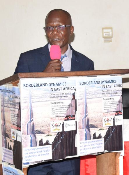 Dr Eria Olowo Onyango, the Coordinator Bordeland Dynamics in East Africa Project at Makerere University addresses participants