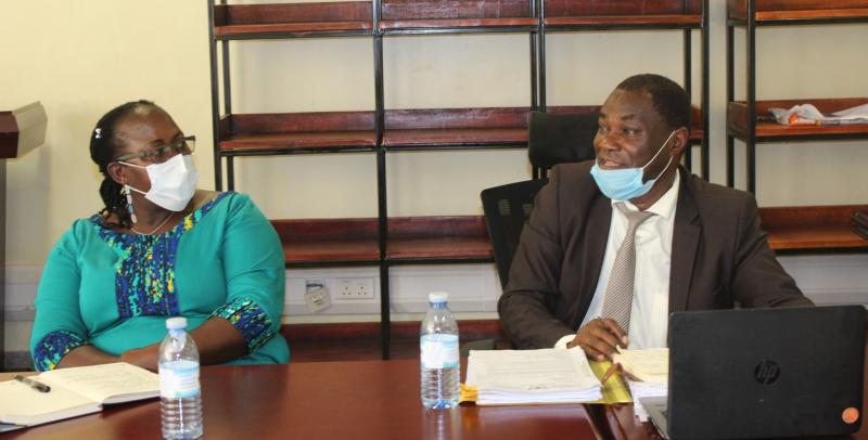 The Principal CHUSS, Dr Josephine Ahikire (L) and another member of the Mak Restructuring Committee, Mr. Turyatemba Joseph at the meeting 
