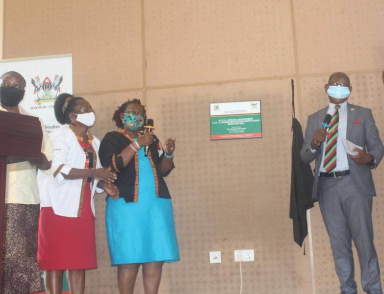 The Vice Chancellor, Prof. Barnabas Nawangwe (R) launching the system