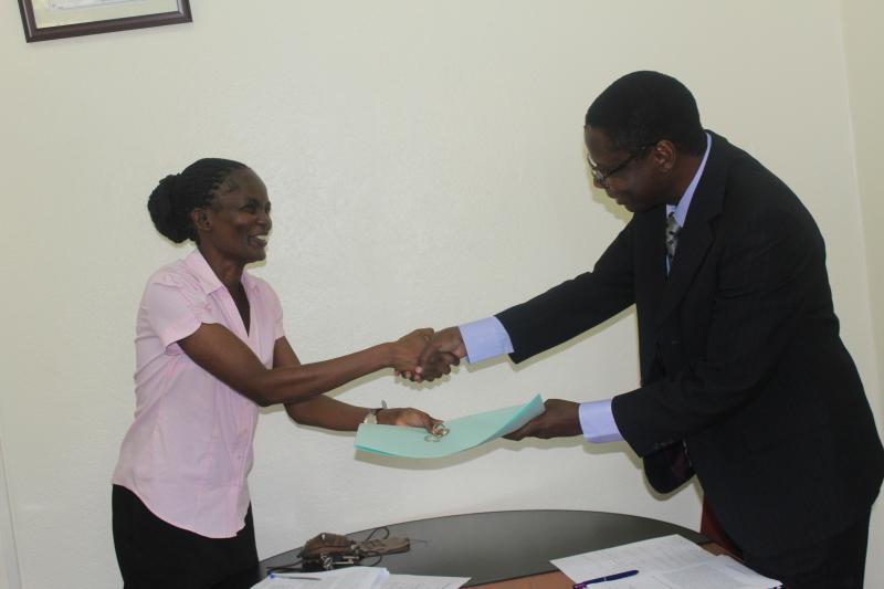 Dr Kiguli hands over to Dr Okot Benge