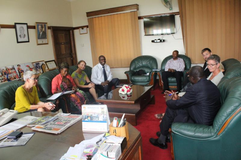 Faculty from the University of Adger in a meeting with Dr Okello Ogwang