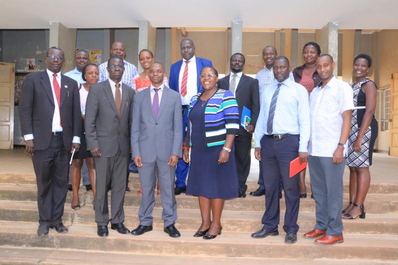 Members of University Management and the CHUSS team in a group photo after the handover ceremony