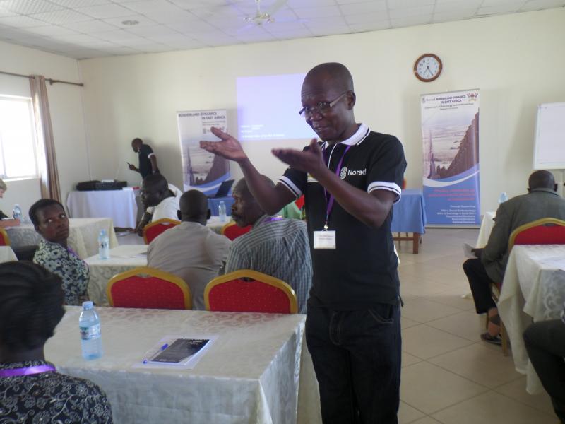 The Coordinator of the project, Dr Eria Olowo Onyango, addresses participants