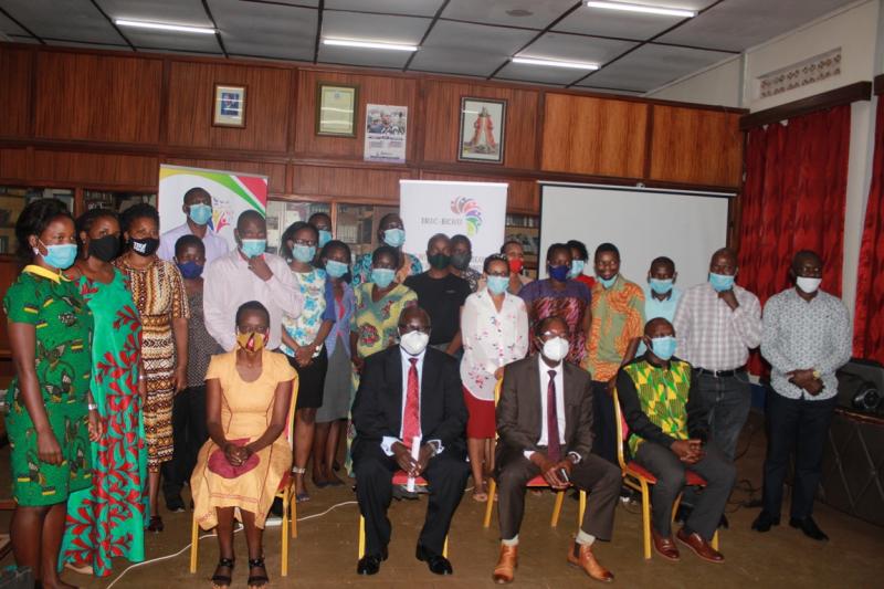Participants at the closing ceremony of the first ever interuniversity Co-Creation workshop on academic writing held at Muteesa I Royal University. Seated and in black suit is Dr. Martin Ongol, the Executive Secretary of the UNCST. Dr. Ongol was the Chief Guest 