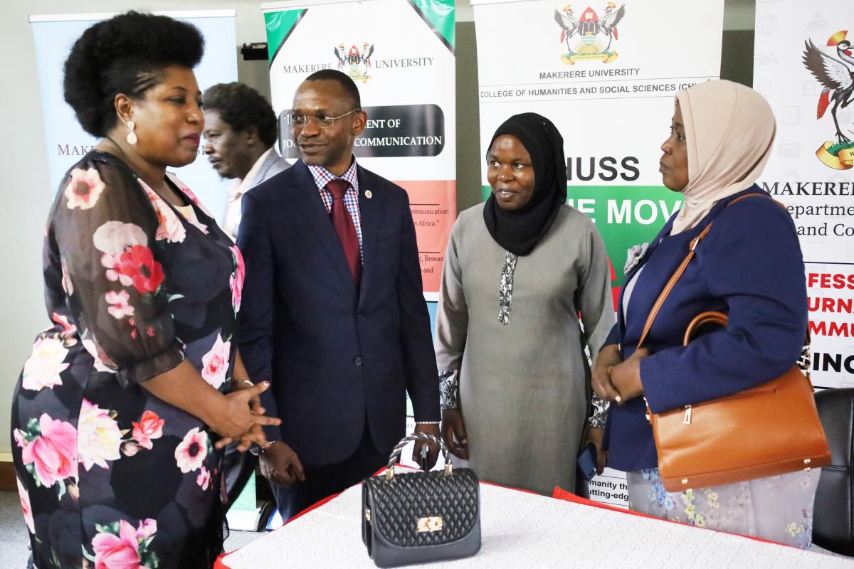 Ms. Sarah Kagingo, Prof. Umar Kakumba. Dr. Aisha Nakiwala and Dr. Saudah Namyalo interact during after the launch