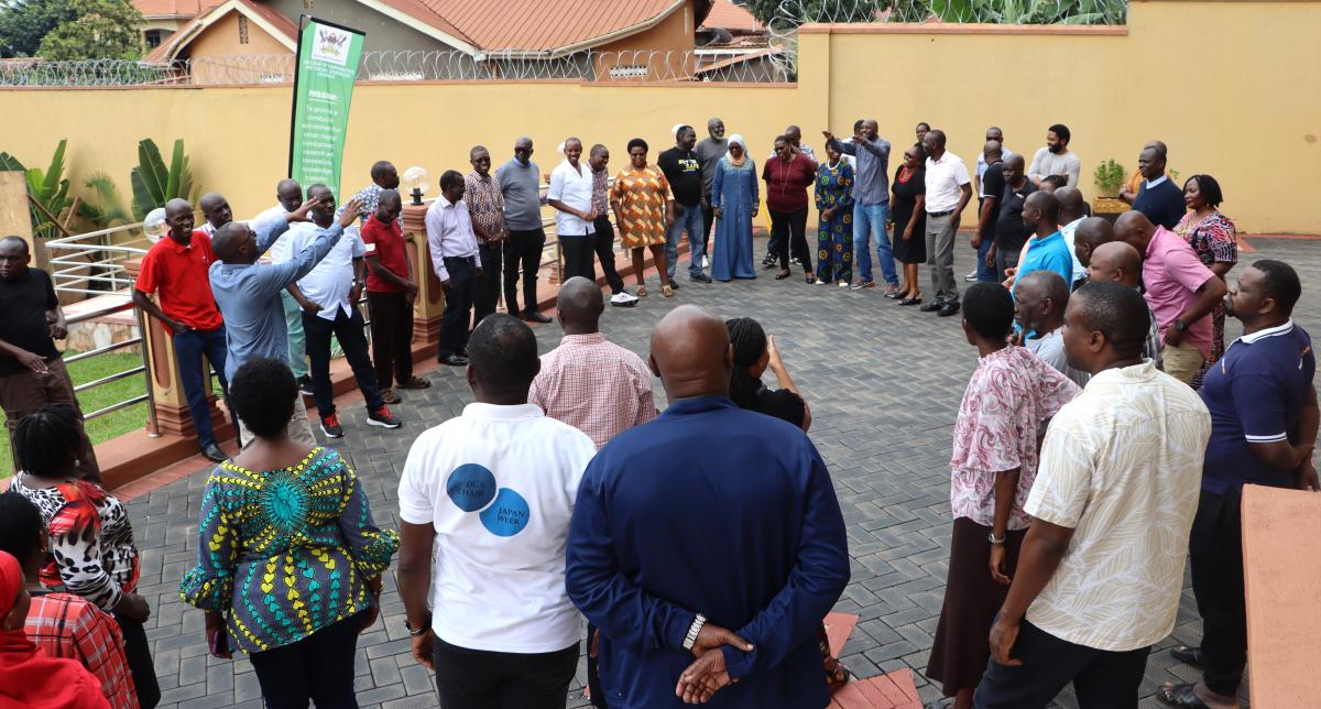 Participants stretching during a session outside the hotel