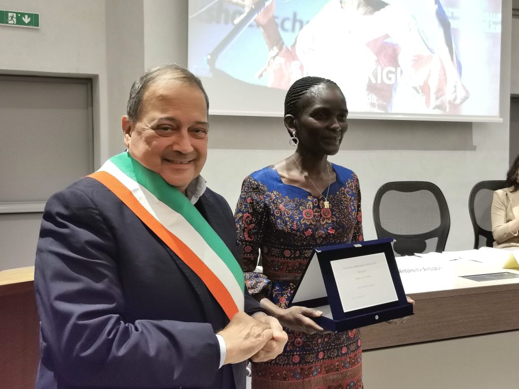 Dr Susan Kiguli was awarded at the festival project chaired by Luigi Di Meglio