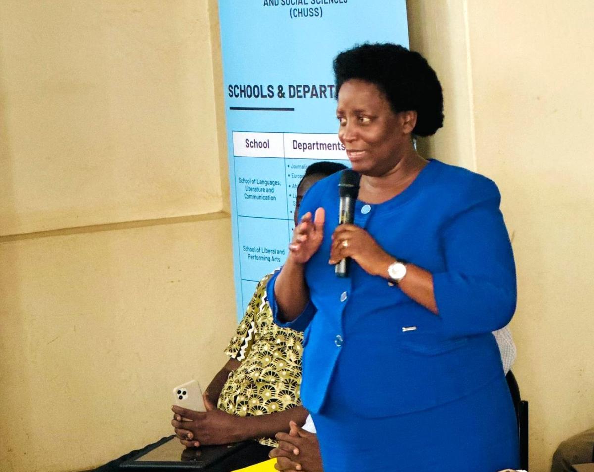 The Principal Assoc. Prof. Helen Nambalirwa Nkabala addresses Mbogo High School Students