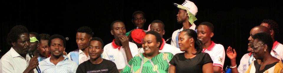 The Dean, School of Liberal and Performing Arts, Assoc. Prof. Patrick Mangeni (R), with some of the trainers and performers at the National Theatre