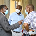 Dr. Peter Atekyereza, Prof. Elias State and Dr. Levis Mugumya interacting during break