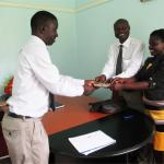 Prof Edward K Kirumira has hands over USD1310
