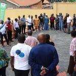 Participants stretching during a session outside the hotel